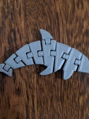 Flexi Dolphin - Quick Print is a beautifully designed 3D printable model, perfec